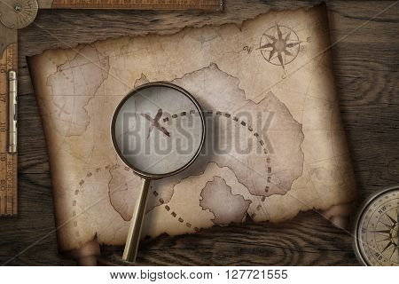 treasure map on wooden desk with compass 3d illustration