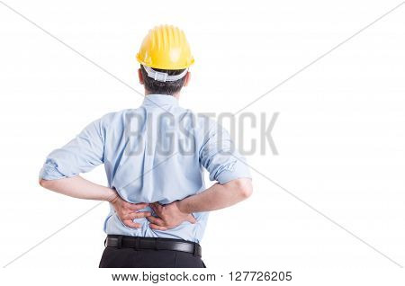 Engineer or architect feeling lower back pain after a long work day