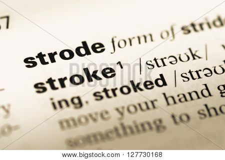 Close Up Of Old English Dictionary Page With Word Strode.