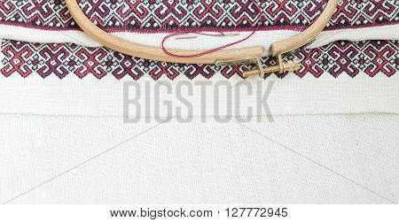 Fragment of embroidery on linen and accessories