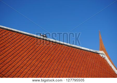 The temple roof of thailand with blue sky