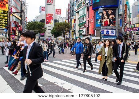TOKYO JAPAN - OCTOBER 10 2015 - Shibuya Crossing One of the world's most used pedestrian scrambles at Hachiko Square in Shibuya special ward.