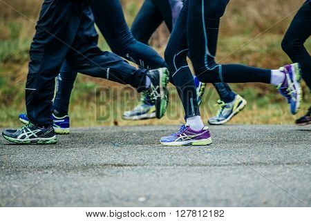 closeup of feet group athletes men running down road during marathon
** Note: Soft Focus at 100%, best at smaller sizes