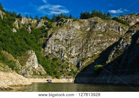 Rocky landscape of river Uvac gorge at sunny summer morning, southwest Serbia