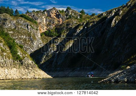 Rocky landscape of river Uvac gorge at sunny summer morning, southwest Serbia