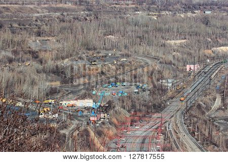 huge quarry iron ore mining in Gubkin Russian spring