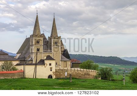 Saint Martins gothic cathedral and wall of fortness from west. Unesco monument. Spisska Kapitula, Slovakia