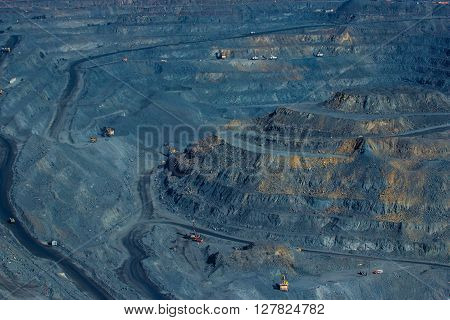 rock formations in the vast quarries of ore together with the technique