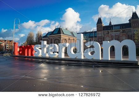 Rijksmuseum and Statue I  am Amsterdam at summy morning, Netherlands