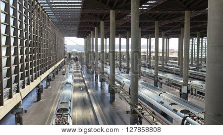 Madrid Spain April 7 2016: Top view of Madrid Atocha Railway station with train and platform. Madrid Spain April 7 2016