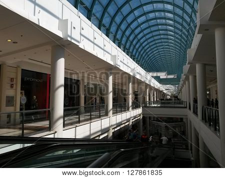 ORIO AL SERIO BERGAMO ITALY - CIRCA SEPTEMBER 2015: Orio Center shopping mall interiors with arch roof