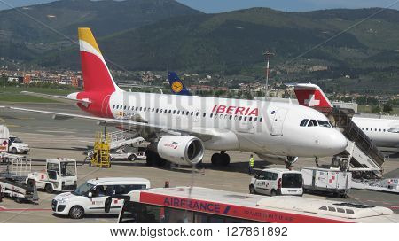 FLORENCE ITALY - CIRCA APRIL 2016: Airbus A 319 aircraft of the Iberia airlines parked at the airport of Florence