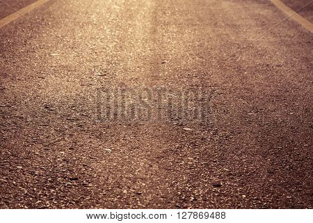 mpty asphalt roadway with sunlight, transport industry