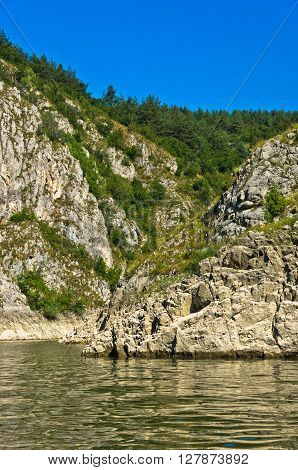 Rocky landscape of river Uvac gorge at sunny summer morning, southwest Serbia