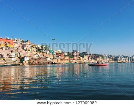 India, Varanasi, - March 7, 2015: Varanasi city landscape - view from the Ganga river, India, morning city river view, ancient city landscape