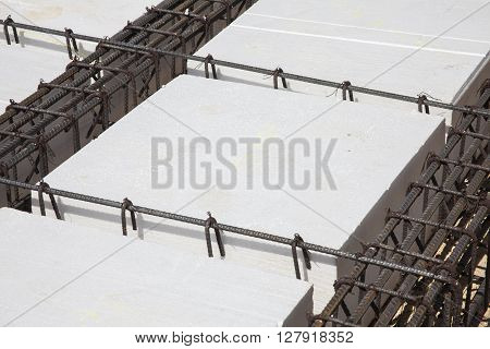 Iron framework and polyurethane  to build a foundation for a building