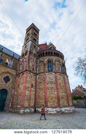 Maastricht Netherlands - April 11 2016: Basilica of Saint Servatius with unidentified people. The church is regarded as the oldest preserved church in the Netherlands