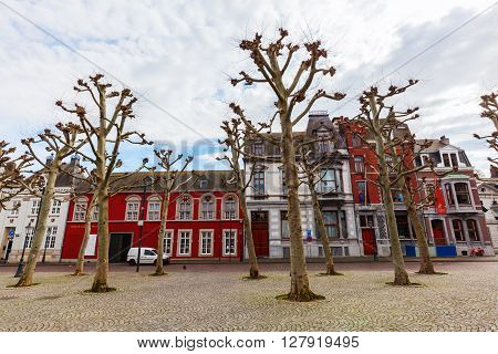 Maastricht Netherlands - April 11 2016: Vrijthof in Maastricht with unidentified people. Vrijthof the largest and best-known square in Maastricht with many well-known pubs and restaurants