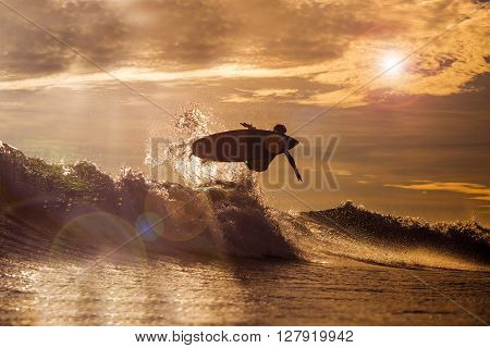 Surfer  At Sunset Tme