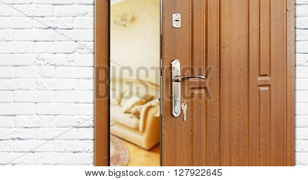 Half opened door to a living room. Door handle, door lock. Lounge door half open. Opening door. Welcome, privacy concept. Entrance to the room. Door at white brick wall, modern interior design.