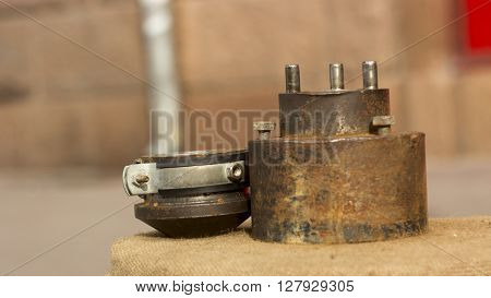 tool on a wooden deck for minting coins souvenir nature