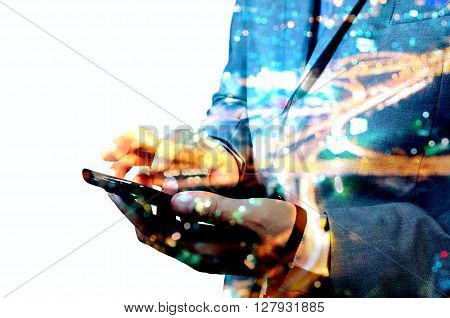 Double Exposure Of Businessman Swipe Mobile Smartphone With Night City