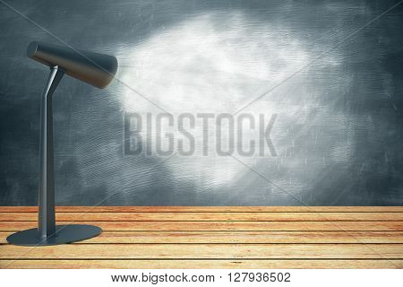 Turned on table lamp on wooden surface illuminating chalkboard. Mock up 3D Rendering