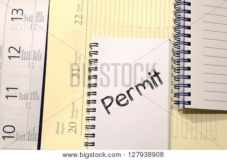 Permit text concept write on notebook .