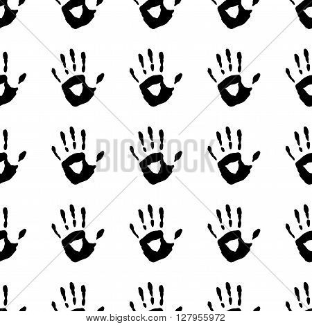 Vector seamless pattern with a hand prints