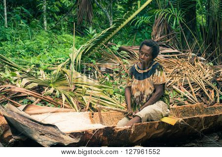 Woman In Canoe