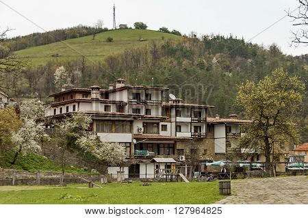 Etar,  Gabrovo, Bulgaria - April 13, 2012: Part of Etar village with guest house in old architectural style, Gabrovo town, Bulgaria. Visit of Gabrovo region in springtime.