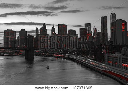 New York City night skyline with red lights in black and white landscape