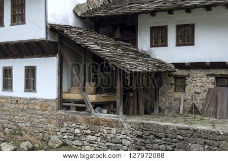 Etar,  Gabrovo, Bulgaria - April 13, 2012: Old traditional houses with  room for roast in old brick oven, Etar, Gabrovo, Bulgaria. Visit of Gabrovo region in springtime.