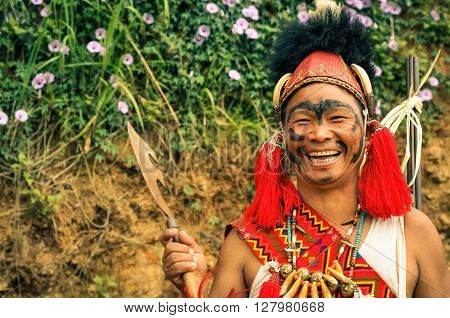 Smiling Man With Axe