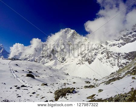 White mountains, sunny day and clear blue sky, snow and ice,  trek to Everest Base Camp, Nepal