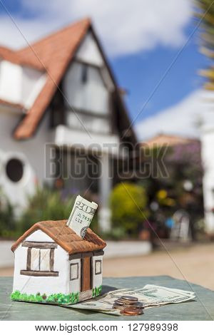 Saving money (dollars) to buy the house of my dreams