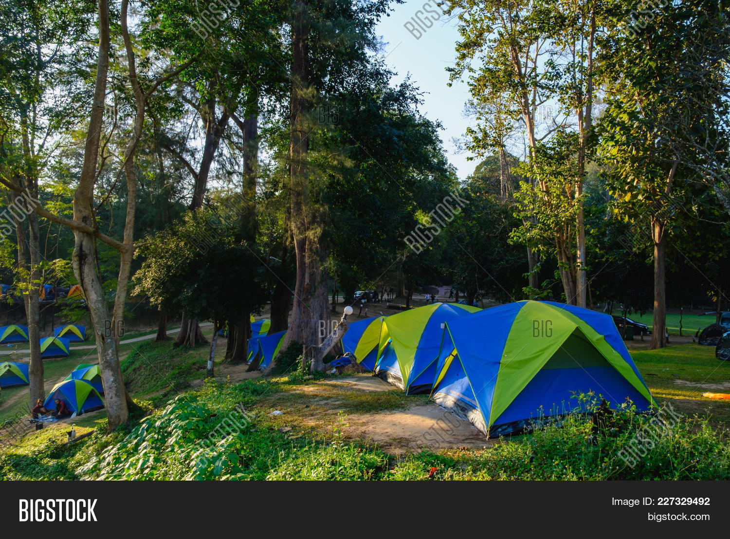 camping tent in the lawn powerpoint template camping tent in the camping powerpoint template