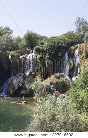 Studenci, Bosnia And Herzegovina - August 16 2017: Scenic View Of Kravica Waterfalls In Bosnia Herze