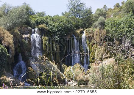 Ljubuski, Bosnia And Herzegovina - August 16 2017: Natural Reserve Of Kravica Waterfalls In Bosnia H