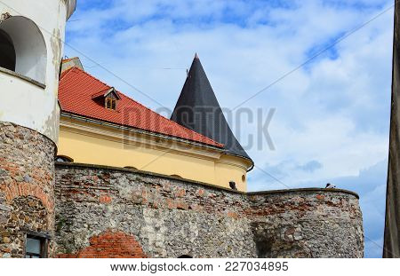 Mukachevo, Ukraine - August 23 , 2017 , Side View Of The Rock Walls Of The Palanok Castle Or Mukache