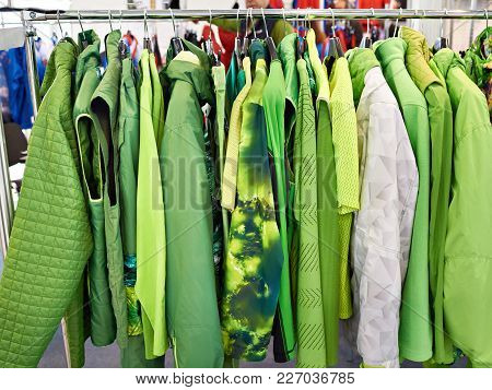 Jackets, Waistcoats And Rainwear On Hanger In Store