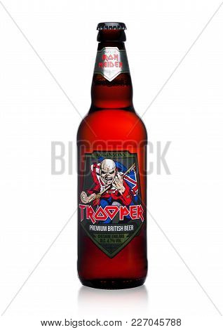 London, Uk - February 14, 2018: Cold Bottle Of Trooper Premium British Beer On White Background. Cre