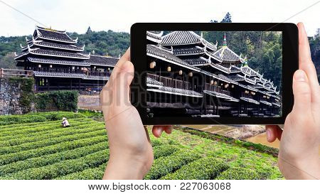 Travel Concept - Tourist Photographs Chengyang Wind And Rain (fengyu, Yongji, Panlong) Bridge In San