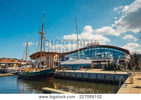 Kolobrzeg, Poland - April 08, 2016: View On Harbor In Kolobrzeg With Many Moored Boats And Ships. Ko
