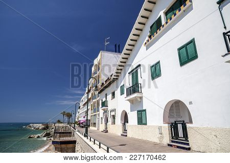 Sant Pol De Mar,spain-may 10,2012: Promenade And Mediterranean Sea In Catalan Village Of Sant Pol De