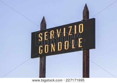 Venice,italy-july 17,2012: Wooden Sign Service, Servizio Gondole, Venice.