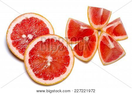 Grapefruit Slices Isolated On The White Background.