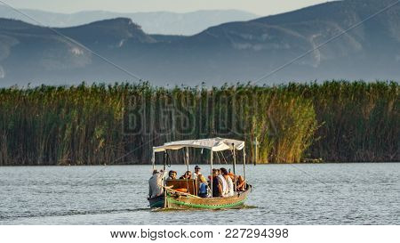 Valencia - September 12: Unidentified Group Of Tourists Enjoy A Tour Around Albufera Lake Over Boat 