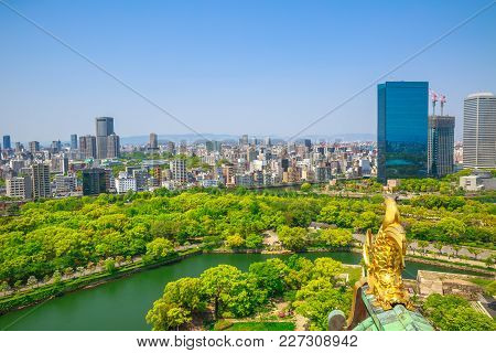 Golden Dragon Fish Statue Or Shachihoko At Roof Top Of Osaka Castle, One Of Most Famous Landmarks Of