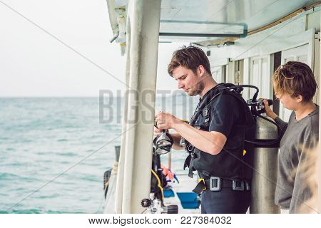 Divers Jump In The Sea To Start Diving.